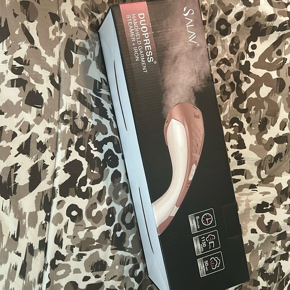 Handheld garment steamer and iron